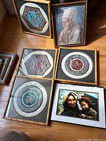 Group shot of all six framed pieces on floor