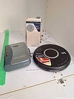 Group shot of Sony cassette Walkman, Sony CD Walkman and Panasonic radio