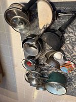 Overview of entire cookware assortment laid out