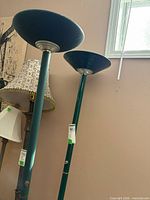 Upper sections of both torchiere lamps showing bowl shades and color