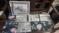 All six framed prints displayed on bench