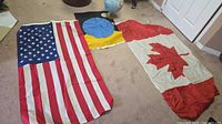 All three flags laid out with tabletop globe visible