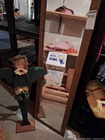 Angel figure and mirror standing together