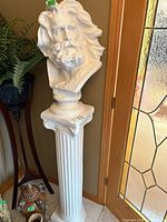 Full view of bust on pedestal