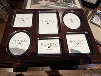 Top of Bombay wood box showing six photo openings