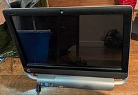 Front view of HP TouchSmart 7320 showing touchscreen and stand