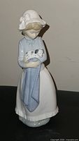 Front view of porcelain figurine