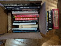Overall view of boxed books plus four standing volumes