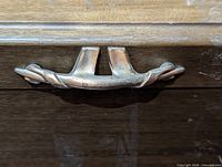 Close-up of wooden case handle