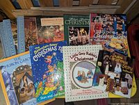 All nine Christmas books laid out showing covers