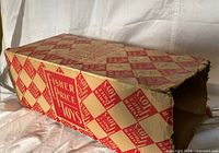 Close view of original Fisher-Price Toys checkerboard box