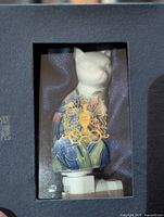 Night light in closed display box, front view through window