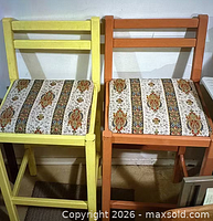 Front view of both stools showing colours and seats