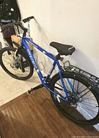 Full view of Trek 3900 mountain bike with rear rack and gel seat