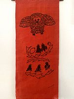 Full view of Agnes Nanogak burlap wall hanging showing owl and birds imagery