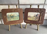 Both framed prints on stands showing overall design