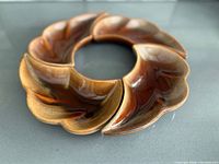 Top view of four Beauceware dishes forming ring