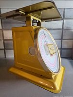 Front view showing dial, logo, and base