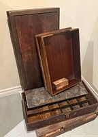 Stacked view of all wooden boxes showing relative sizes