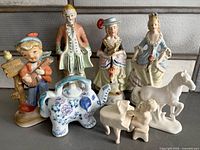 Group shot showing all eight porcelain items