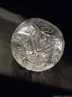 Full view of spherical cut-crystal vase