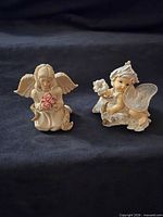 Front view showing both figurines side by side