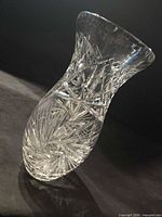Entire vase on its side showing full cut pattern