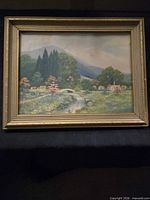 Front view of framed landscape print