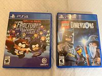 Front view of both PS4 game cases