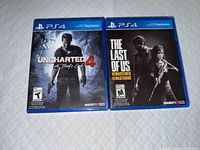 Front covers of both PS4 game cases