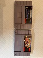 Front view of both SNES cartridges showing labels