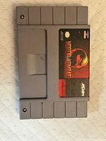 Mortal Kombat SNES cartridge front view