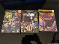 Front view of all three GameCube game cases upright