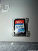 Front view of Nintendo Switch Sports cartridge in clear case