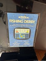 Front view of Fishing Derby Atari 2600 cartridge showing label details