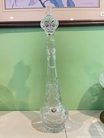 Full view of tall Bohemia cut crystal decanter with stopper