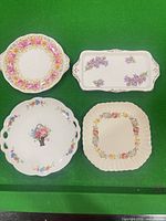 Front view of all four plates showing patterns and shapes