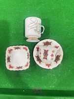 Top view showing all four bone china pieces and pattern details