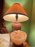 Lamp and Himalayan salt bowl grouped on table
