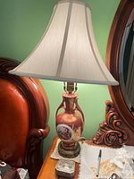 Whole lamp with shade and trinket box on tabletop