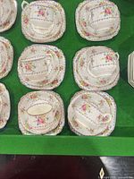 Top view showing six teacup and saucer sets