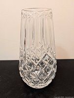 Full view of clear Waterford crystal vase showing diamond cross cut and fluted pattern