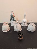 Group shot of all six bells showing designs and relative sizes