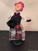 Front view of Byers Choice caroler showing attire and stance