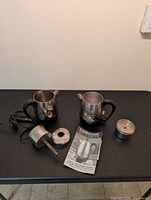 Both percolators with cords, loose parts, instruction sheet