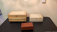 Three jewelry boxes arranged on table