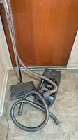Full view of Kenmore canister vacuum with hose, wand and power nozzle