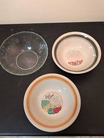 overview of three bowls: one glass, two ceramic