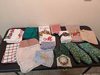 All kitchen linens laid out on table