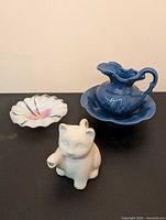 Group shot of jug with bowl, flower dish and kitten creamer